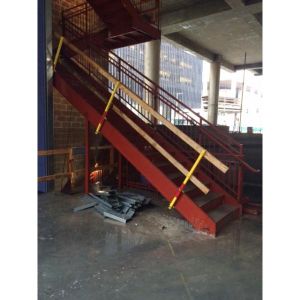 Stringer stair rail protection