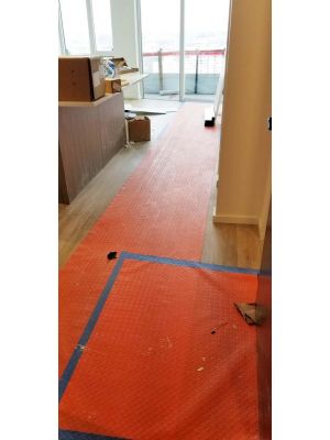 Economy Coverguard protecting newly installed apartment wood flooring